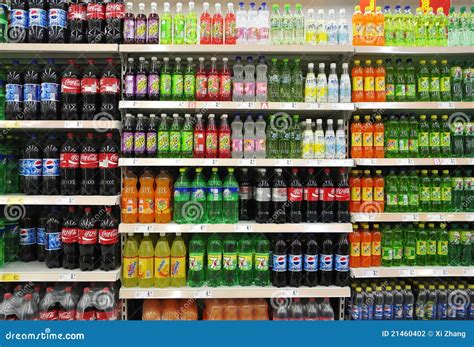 Soft Drinks Or Carbonated Drinks Arranged And Stacked On The Rack