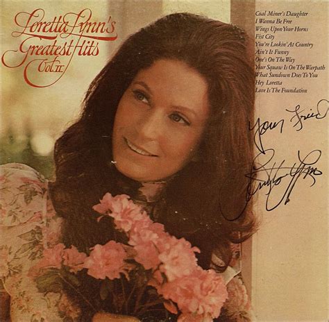 An Autographed Photo Of A Woman With Flowers In Her Hand And The