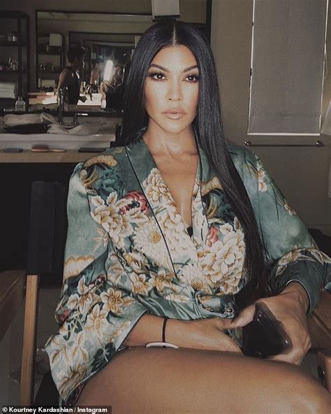 Kourtney Kardashian Flaunts Her Toned And Bronzed Legs While Sporting Patterned Robe In