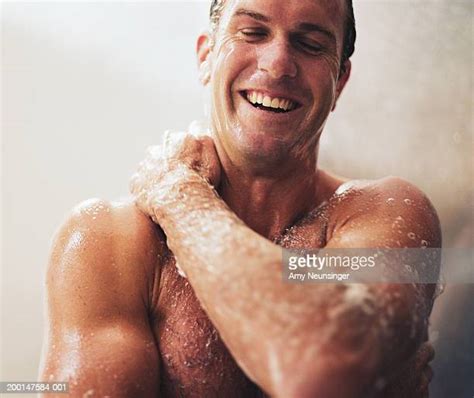 Men Taking Showers Photos And Premium High Res Pictures Getty Images