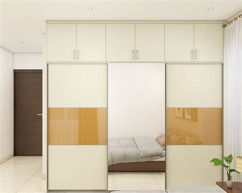 Modern Wardrobe Design With Mirrors And Sliding Shutters Livspace