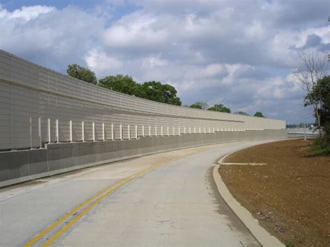 Noise barrier can significantly reduce the sound level. Highway Sound Barrier | Highway Noise Barriers | Road ...