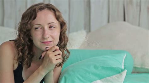 Attractive Curly Woman Lying In Bed Smiling And Looking Around Dolly Shot Stock Video Video