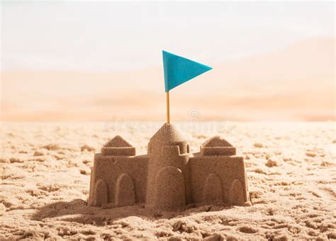 Sand Castle With Flag On The Sea Shore Stock Photo Image Of Detail