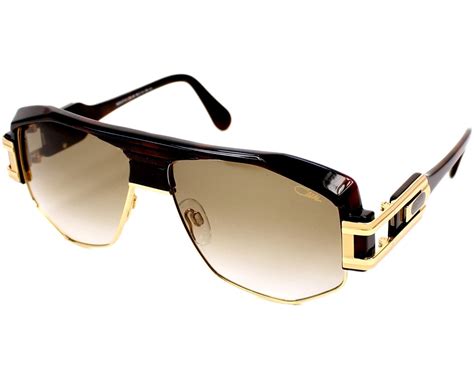 Achetez vos lunettes de soleil pour homme en ligne à prix spécial. Cazal Sunglasses 671-3 080 Havana - Visionet