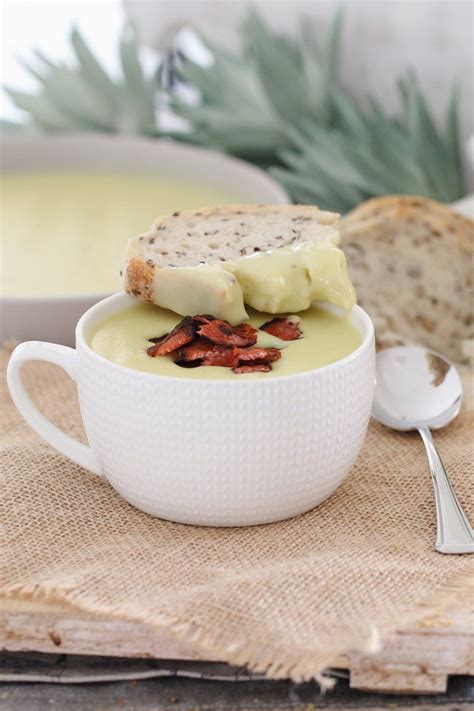 A Creamy Potato And Leek Soup With Crisy Bacon That Will Be On The Table