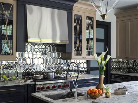 Adding mirror tiles to your walls can not only add a beautiful detail to your interior, but the reflective surface can enhance natural light, creating a feeling of spaciousness. Mirrored Picket Backsplash Tiles - Contemporary - Kitchen