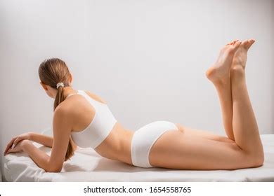 Naked Woman Lying On Stomach Stock Photos Images Photography