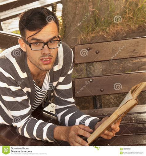 Handsome Young Man Reading Book Outdoors Close Up Stock Photo Image