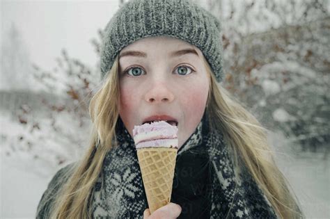 Beautiful Girl Eating Ice Cream Stock Photo