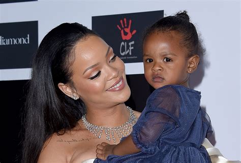 rihanna sparks pregnancy rumor with swing dress in cute video where her niece majesty is