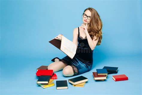 Female Teacher Reading Book Surprised Gesturing Stock Photo Image Of