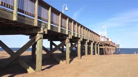 View of boardwalk hotels and people enjoying the beach as seen from. Sandbridge Beach, Virginia February 2014 - YouTube