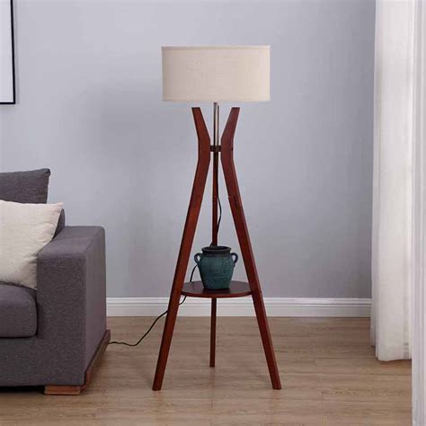 While this lamp by pottery barn ( $199 ) only features a single shelving unit, the tripod frame is unique, combining rustic wood and industrial steel. Mid Century Modern Tripod Floor Lamp,Tripod Floor Lamp ...