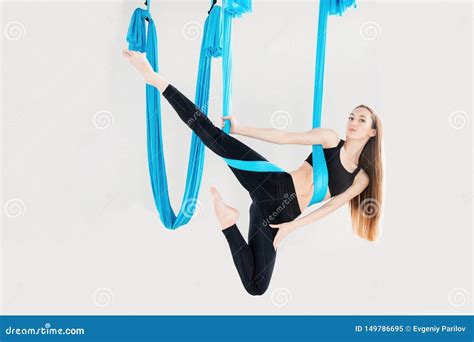 Aerial Fly Yoga In White Gym Young Gymnastics Women In Blue Hammock Stock Image Image Of