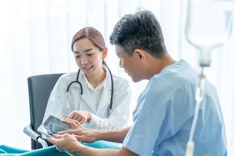 premium photo asian female doctor and senior patient are consultation