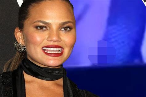 chrissy teigen suffers the ultimate wardrobe malfunction as she flashes nipple at super bowl