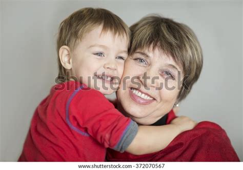 Grandmother Embraces Grandson Stock Photo 372070567 Shutterstock