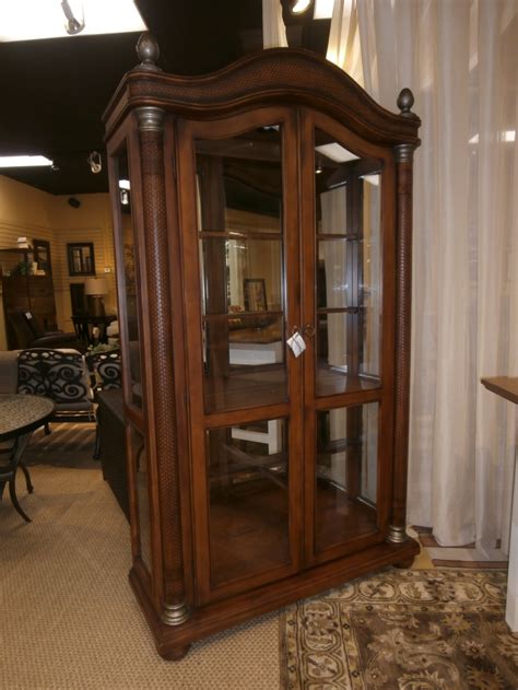 Dressers & chest of drawers. Ashley Curio Cabinet at The Missing Piece