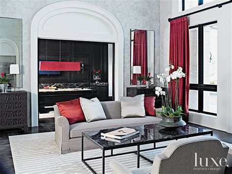 Gray and red living room decorating ideas. Contemporary Gray Living Room with Red Accents | Luxe Interiors + Design
