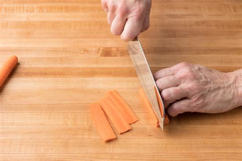 Slice off the rounded edges of the carrot to create a rectangle that sits flat on the cutting board and discard. How to Easily Julienne Carrots