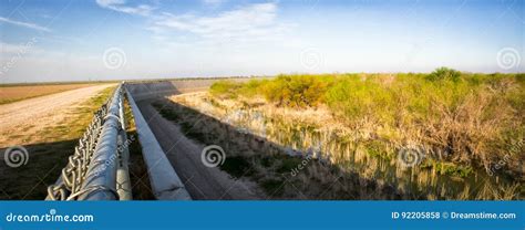 Panorama Of Border Wall Separating United States And Mexico Stock Photo