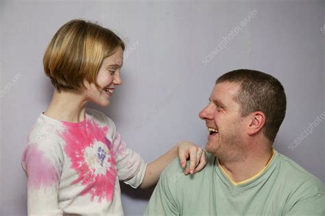 Father And Daughter Laughing Together Stock Image C0464904