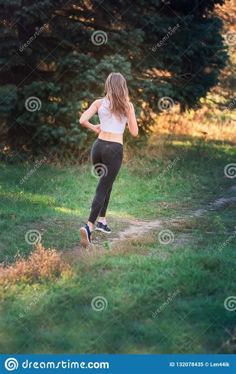 Beautiful Young Sportive Woman Jogging In The Park Stock Image Image