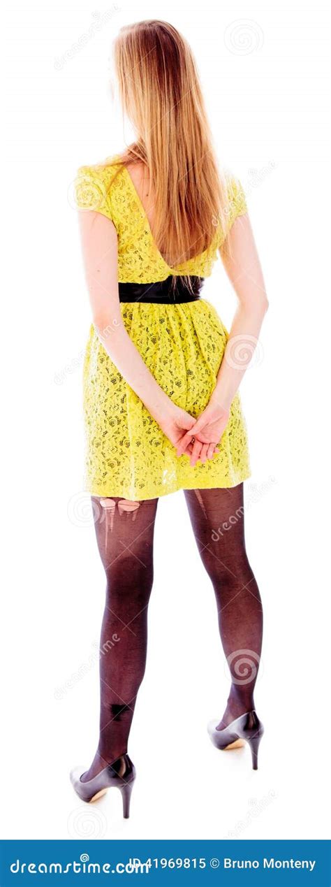 Rear View Of A Young Woman Standing With Her Hands Clasped Stock Image Image Of Vertical Rear