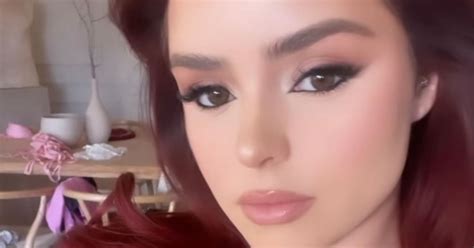 demi rose leaves little to the imagination as she strikes pose in see through dress trendradars
