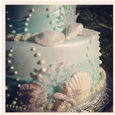 Over the last couple of years, it's become abundantly clear that a wedding cake can pretty much take on any shape, colour, and texture. elegant beach themed cupcakes - Google Search | Beach ...