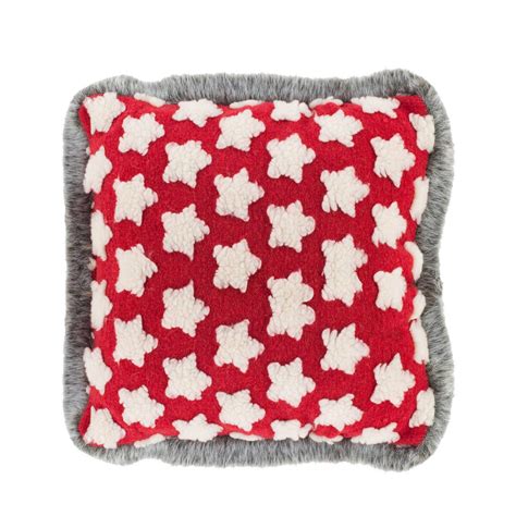 red pillow with snowflakes seasonalabode