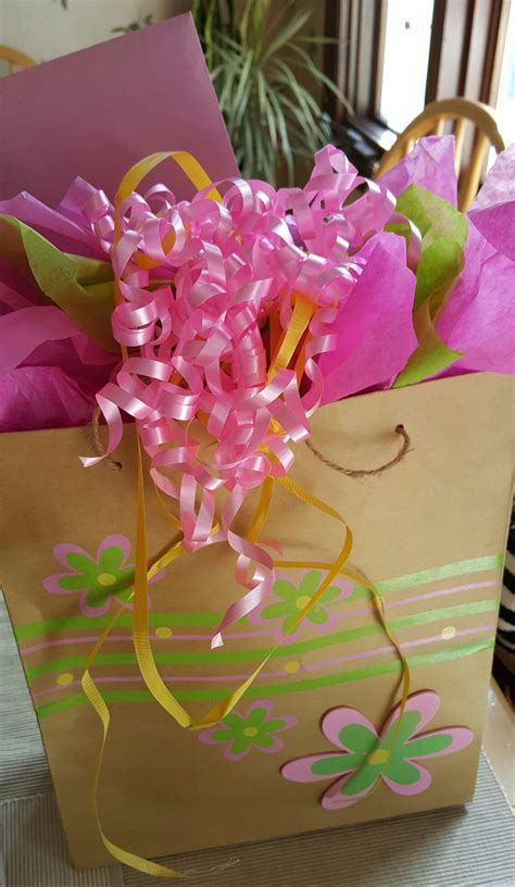 More inexpensive mother's day gift ideas for a crowd. A beautiful Mother's day gift bag decoration | Decorated ...