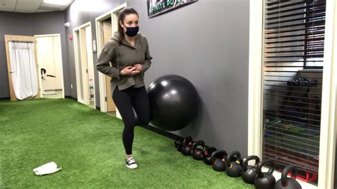 Single Leg Mini Squat With Ball On Wall Youtube