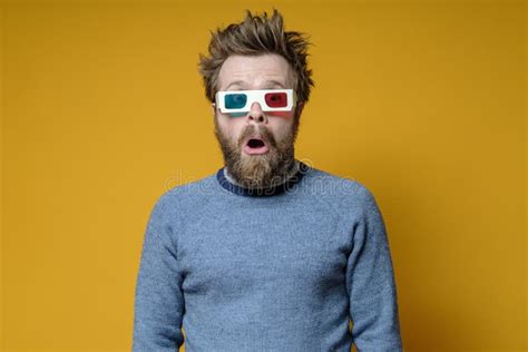 Shaggy Bearded Man With 3d Glasses And An Old Sweater With A