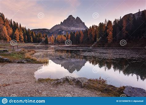 Majestic Autumn Landscapealpine Glacier Lake And Yellow Pine Trees