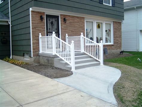 Front porches are great spots for relaxing and entertaining guests. concrete walkway and steps to front door | Concrete front ...