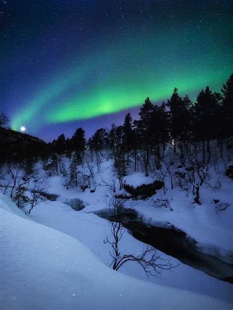 Aurora And A Full Moon Over Tennevik Photograph By Arild Heitmann Pixels