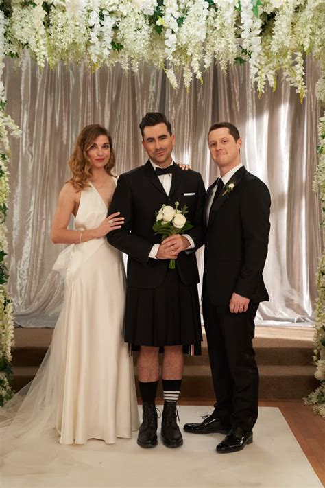 David's black hand print sweatshirt on schitts creek. Schitt's Creek: Every Outfit at David and Patrick's Wedding | POPSUGAR Fashion Photo 22
