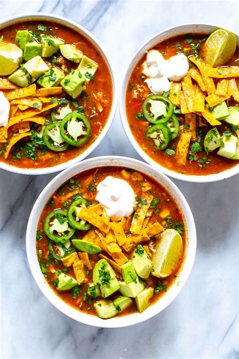 Place chicken in a 6 quart slow cooker and break into bite size pieces with two forks. Crockpot Chicken Tortilla Soup - The Girl on Bloor