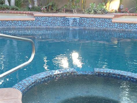 Finished Pool With Glass Tile And Waterfall Yelp