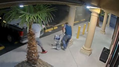 Suspects Caught On Camera Robbing Truck Pepper Spraying Victim Outside Pawn Shop