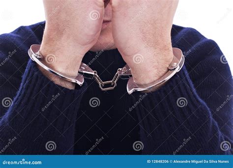 Arms On The Face With A Handcuffs On The Hands Stock Photo Image Of