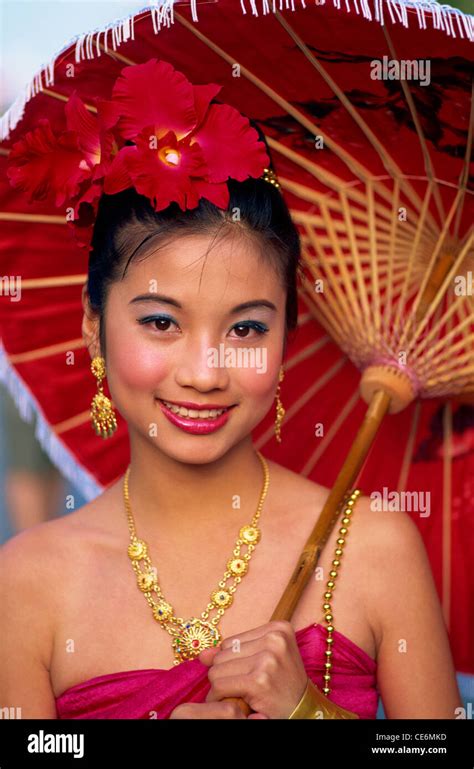 Thailand Chiang Mai Portrait Of Girl In Traditional Thai Costume At The Chiang Mai Flower