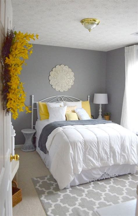 The mix and match darker bed linen is offset by paler semi circles of colour on the bedroom wall and headboard. 20 Grey Bedroom Ideas to Give Your Bedroom A Classy Look