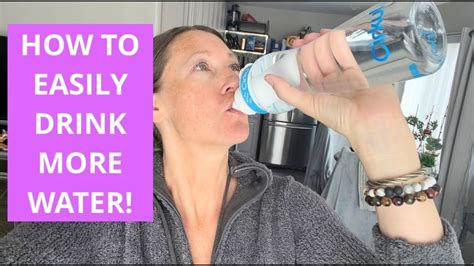 A Woman Drinking From A Water Bottle With The Words How To Easily Drink More Water