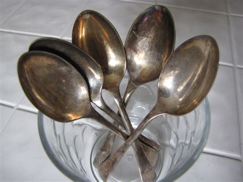 How do you remove tarnish from silver jewelry? a little of this...: Cleaning Tarnished Silver