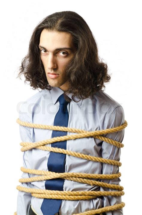 Young Businessman Tied With Rope Stock Image Colourbox
