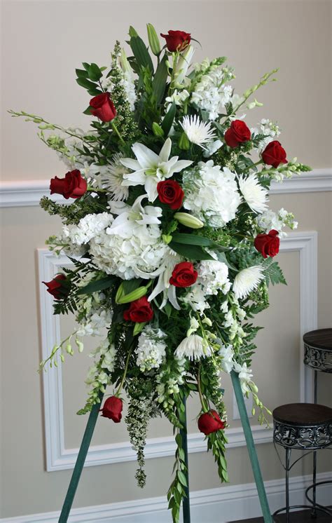 Flowers have a rich history of meaning and symbolism at funerals. Sprays | Funeral flower arrangements, Funeral floral ...