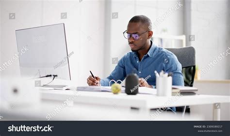 African American Accountant Doing Accounting Tax Stock Photo 2309189217
